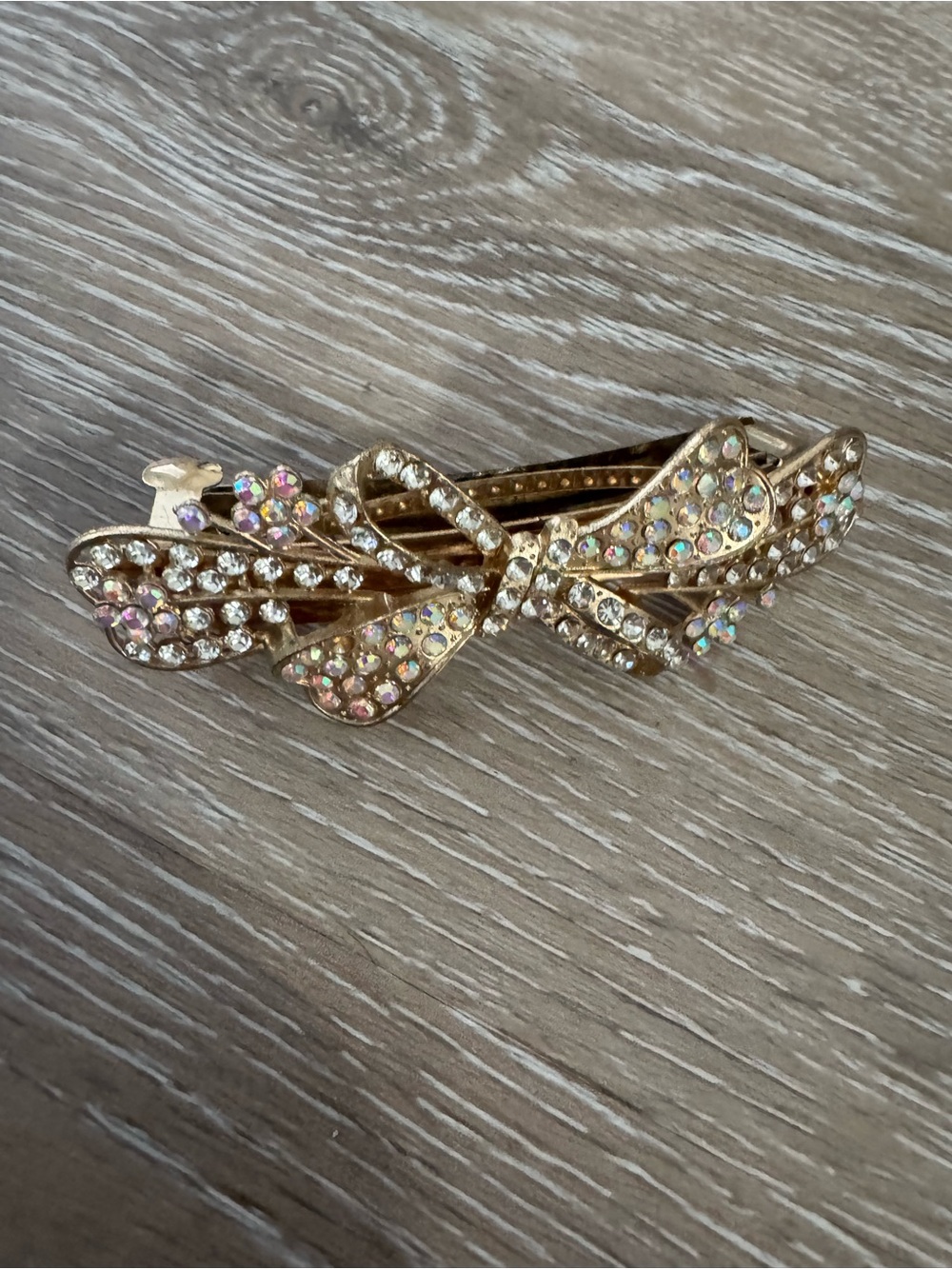 Vintage bow shaped rhinestone hair barrette with Aurora borealis colored gems